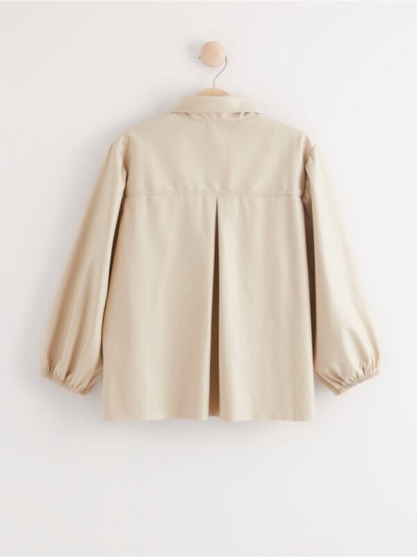 Beige puff sleeve blouse in imitation leather - 8019271-9524