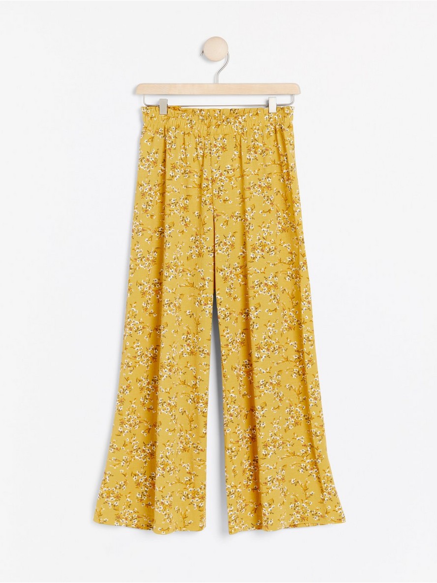 Wide yellow trousers with floral pattern - 7964865-7149
