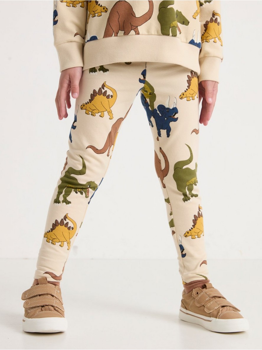 Helanke – Leggings with dinosaurs and brushed inside