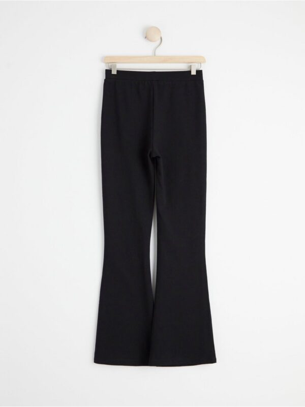 Flared trousers with brushed inside - 8416128-80