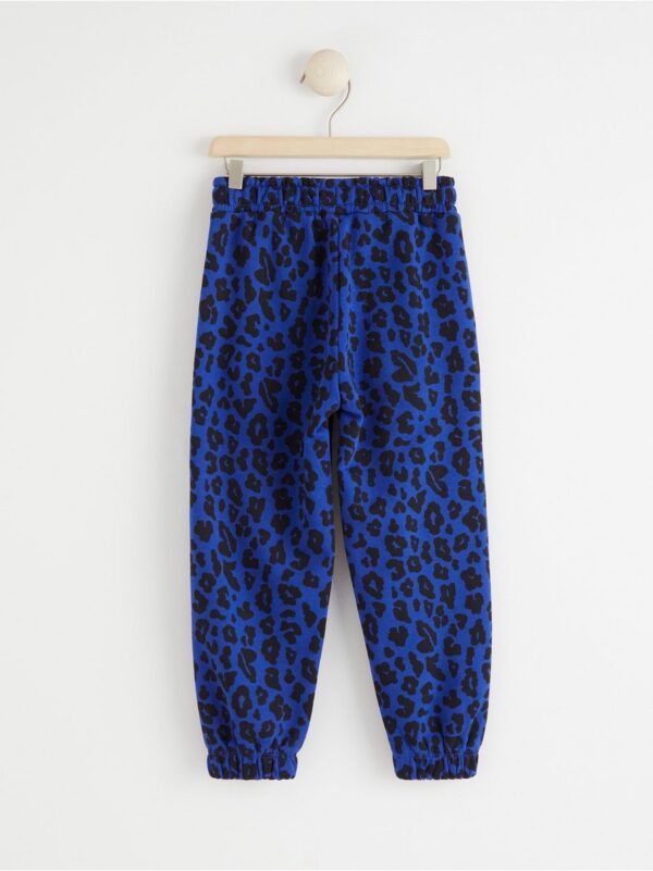 Joggers with allover print - 8423040-7290