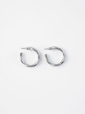 Twisted hoop earrings with rhinestones - 8503407-10