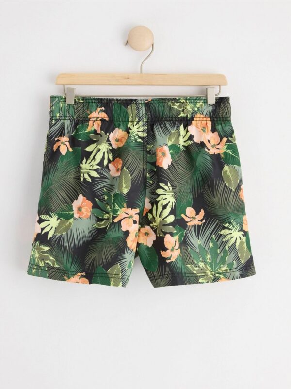 Swim shorts with tropical pattern - 8517819-80
