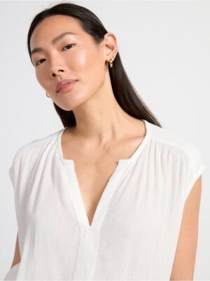 Sleeveless v-neck top with texture - 8583150-300