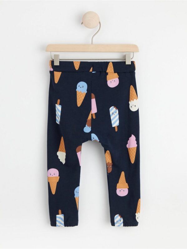Trousers with ice cream print - 8591997-2521
