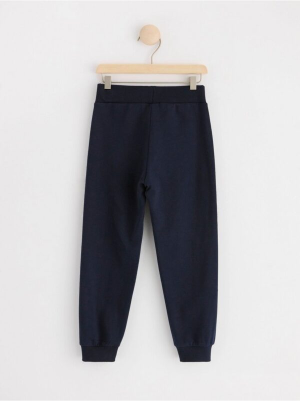 Joggers with working vehicles - 8597119-2521